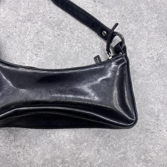 Structured black leather shoulder bag