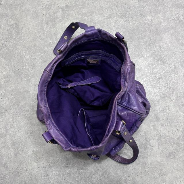 Purple leather city bag