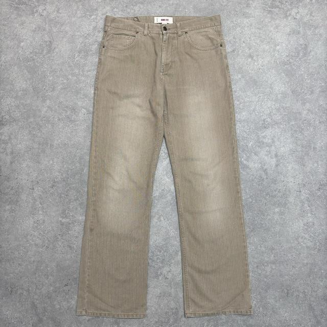 Distressed wash beige jeans