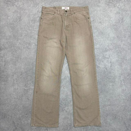 Distressed wash beige jeans