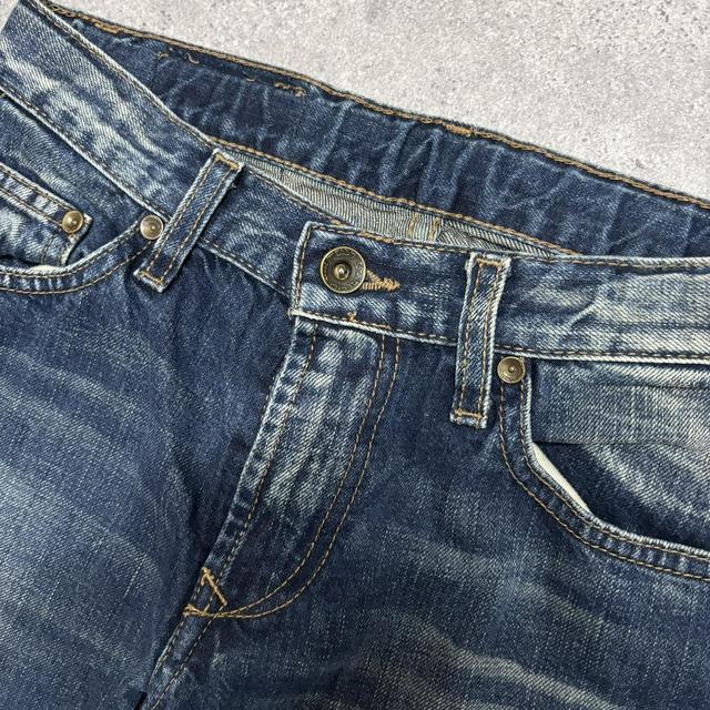 Distressed 90s straight leg jeans