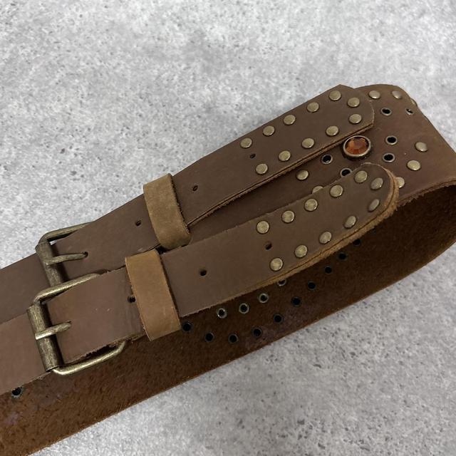 Brown buckle studded belt