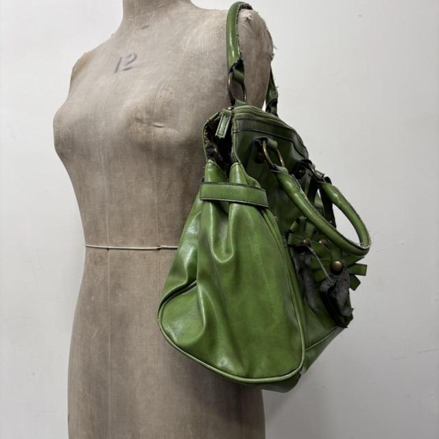Green slouchy leather charm bag