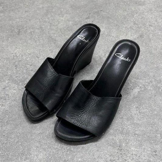 Black leather mules heels