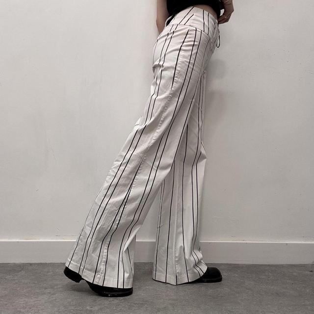 White pinstripe flared suit pants