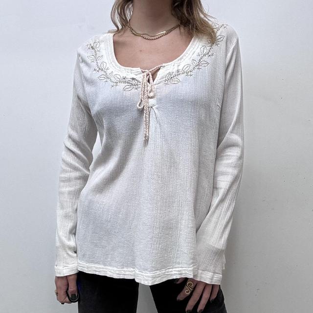 White embroidered flared cheesecloth shirt