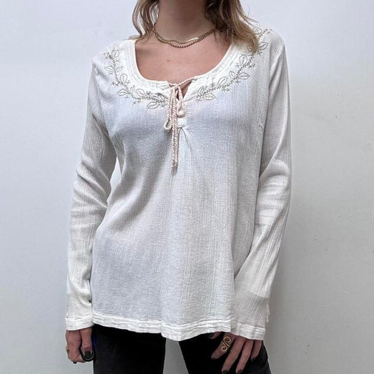 White embroidered flared cheesecloth shirt
