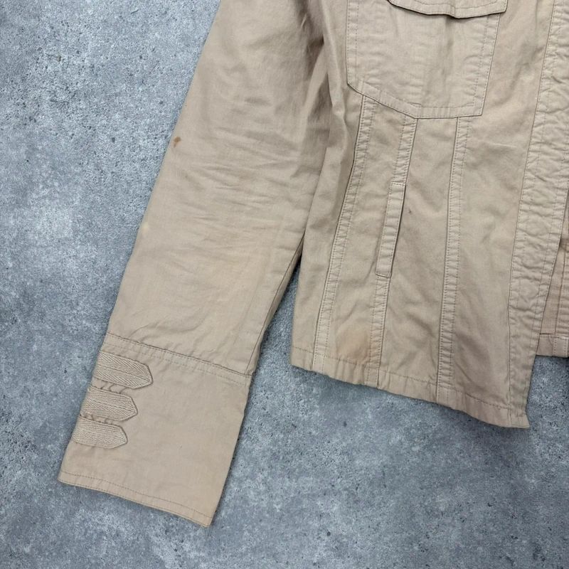 tan fitted panelled military jacket