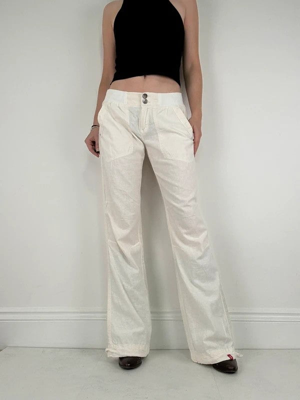 White low rise wide leg flared linen trousers