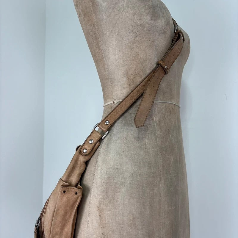 Tan distressed leather zip city crossbody D-ring bag