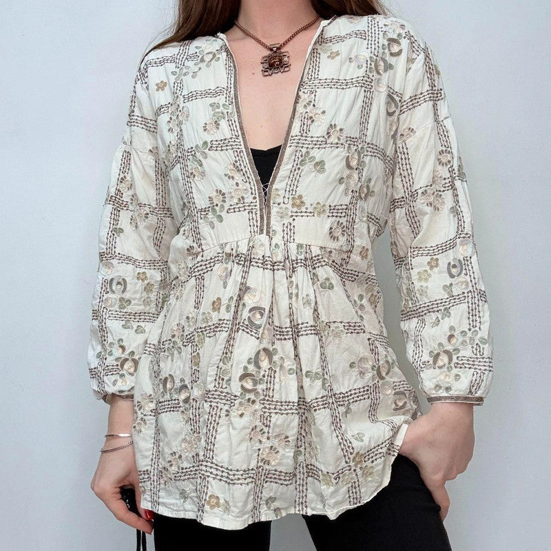 white embroidered flared puff sleeve shirt