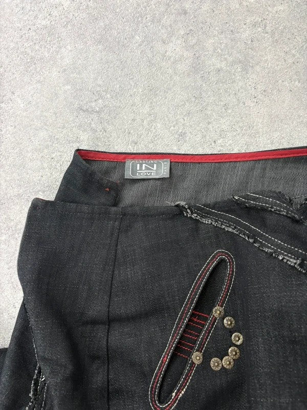 Flared black distressed maxi skirt