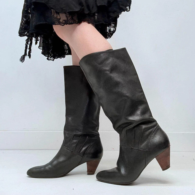 black heel pointed boots