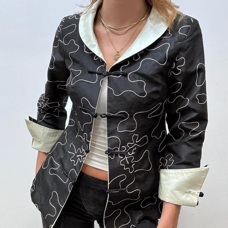 flared emboidered silk jacket