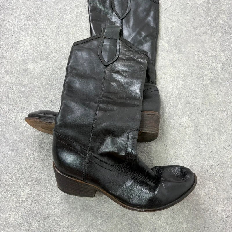 Black leather pointed toe boots