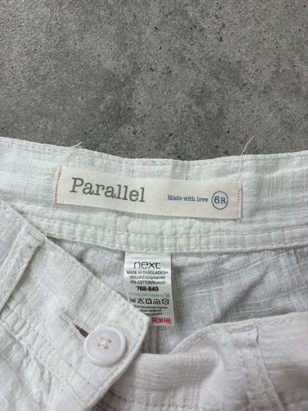 white linen wide leg low rise trousers