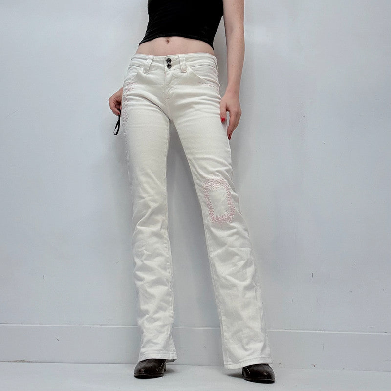 white low rise distressed stitched jeans