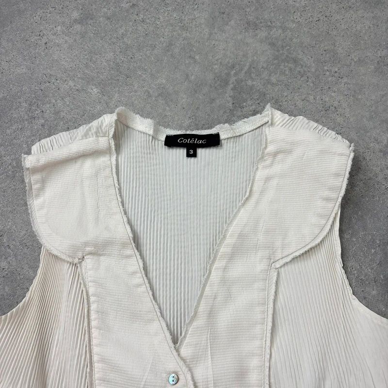 white cotton pleated blouse