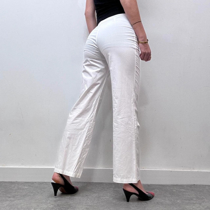 white minimalist flared trousers