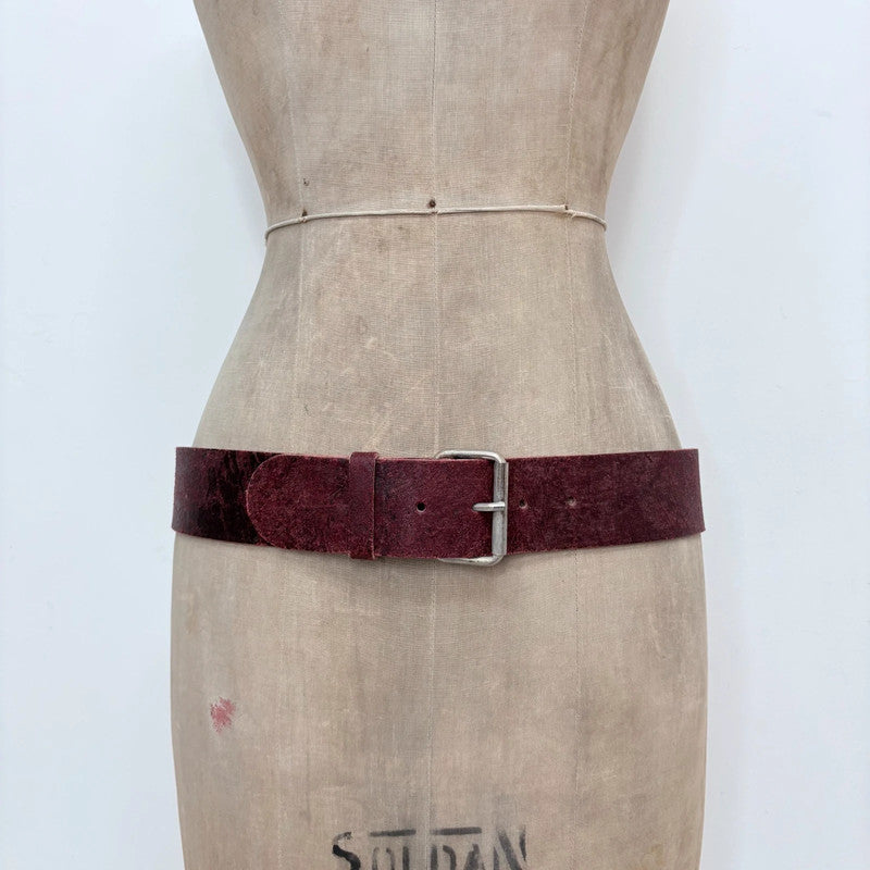 Distressed burgundy red leather belt