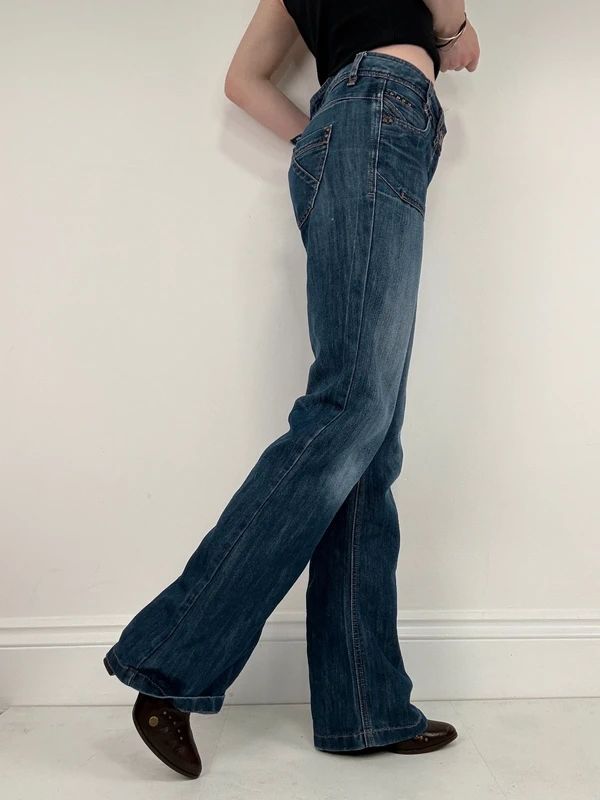 Low rise distressed buckle back Jeans