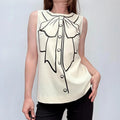 cream Moschino Bow printed twee vest