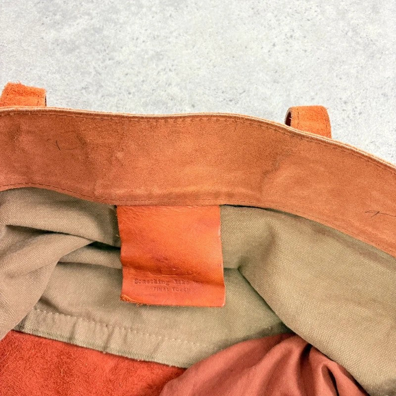 Slouchy oversized leather and canvas shoulder bag