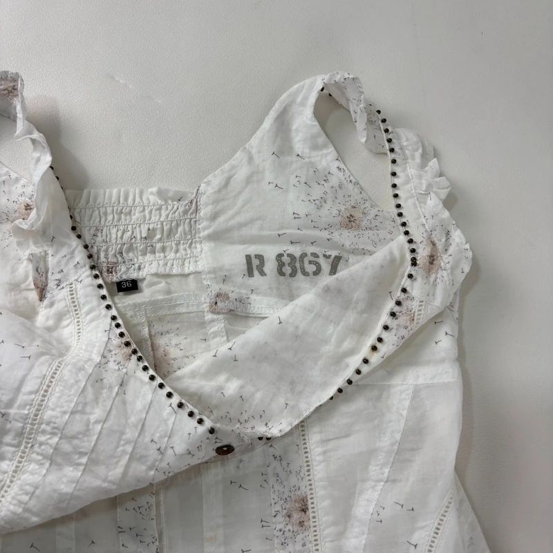 white button through cotton vest