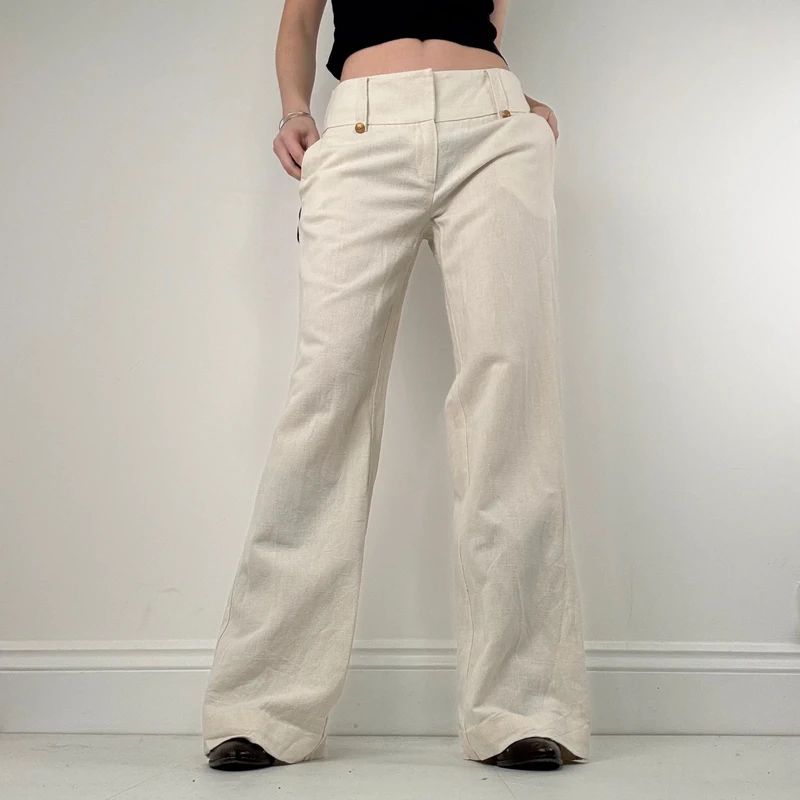 white flared wide leg thick waistband trousers