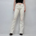 white low rise distressed stitched jeans