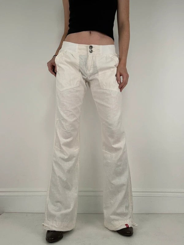 White low rise wide leg flared linen trousers