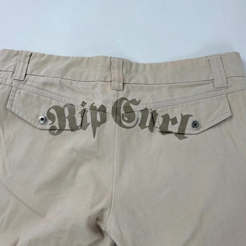 tan canvas wide leg spellout rip curl surfer pants
