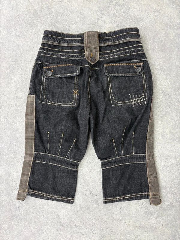 distressed black denim jorts capri pants
