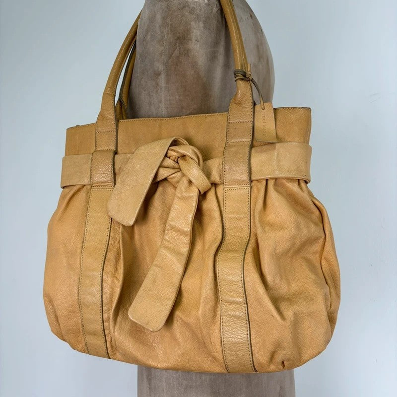 Cream yellow leather knot pleated handbag