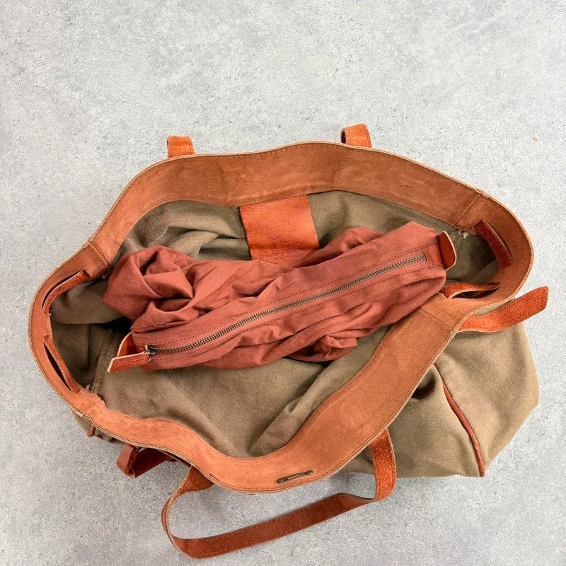 Slouchy oversized leather and canvas shoulder bag