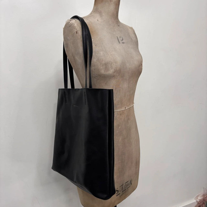 black faux leather tote bag