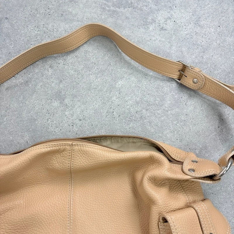Slouchy cream leather cargo pocket satchel bag
