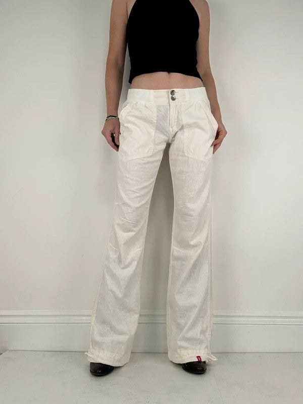 White low rise wide leg flared linen trousers