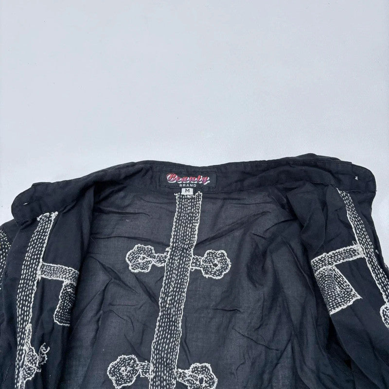 black embroidered stitched button shirt