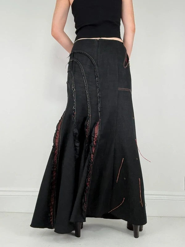 Flared black distressed maxi skirt
