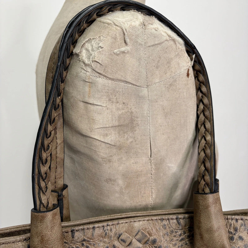 brown textured snake skin bag