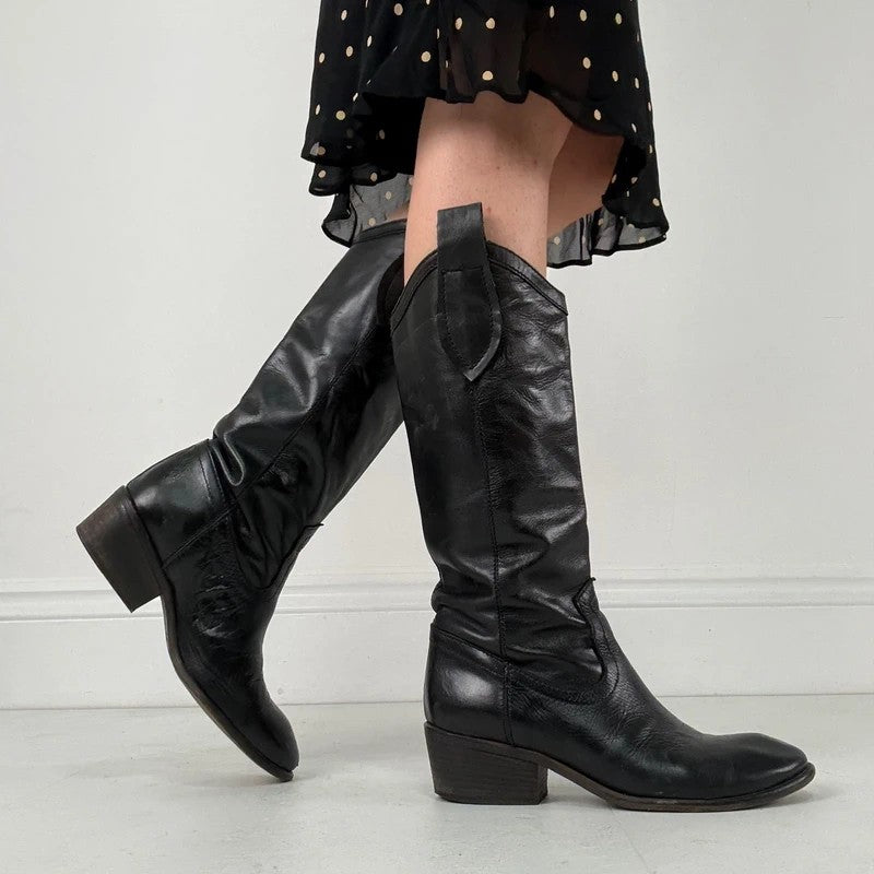 Black leather pointed toe boots