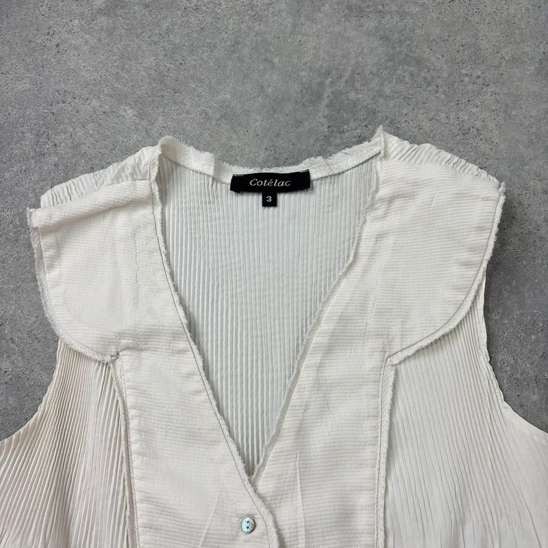 white cotton pleated blouse