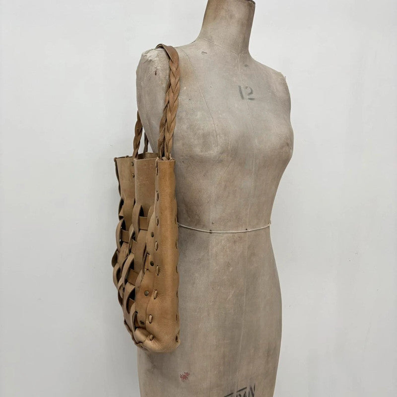 tan leather woven tote bag