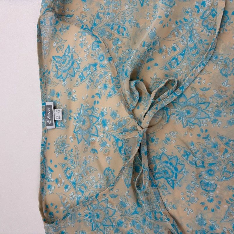 sheer floral flutter ETAM blouse with flare cuffs