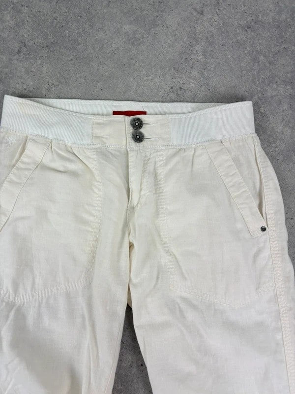 White low rise wide leg flared linen trousers