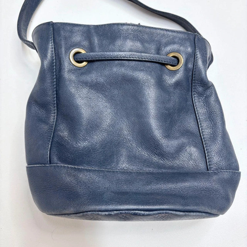 navy blue tassle bucket bag