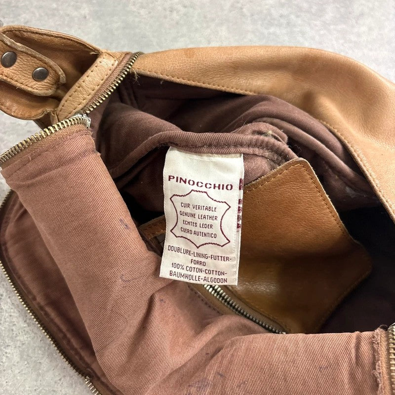 Tan distressed leather zip city crossbody D-ring bag