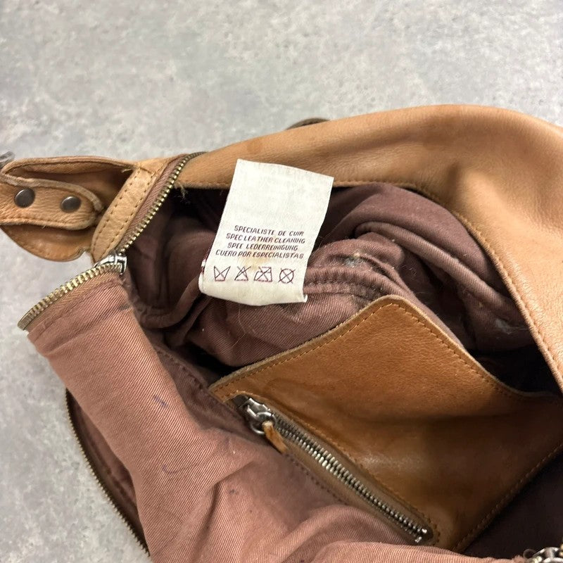 Tan distressed leather zip city crossbody D-ring bag