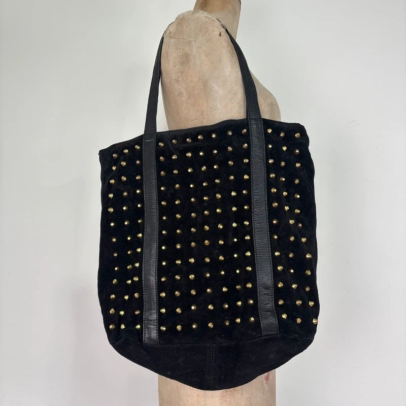 Black suede tote bag with gold studded spikes
